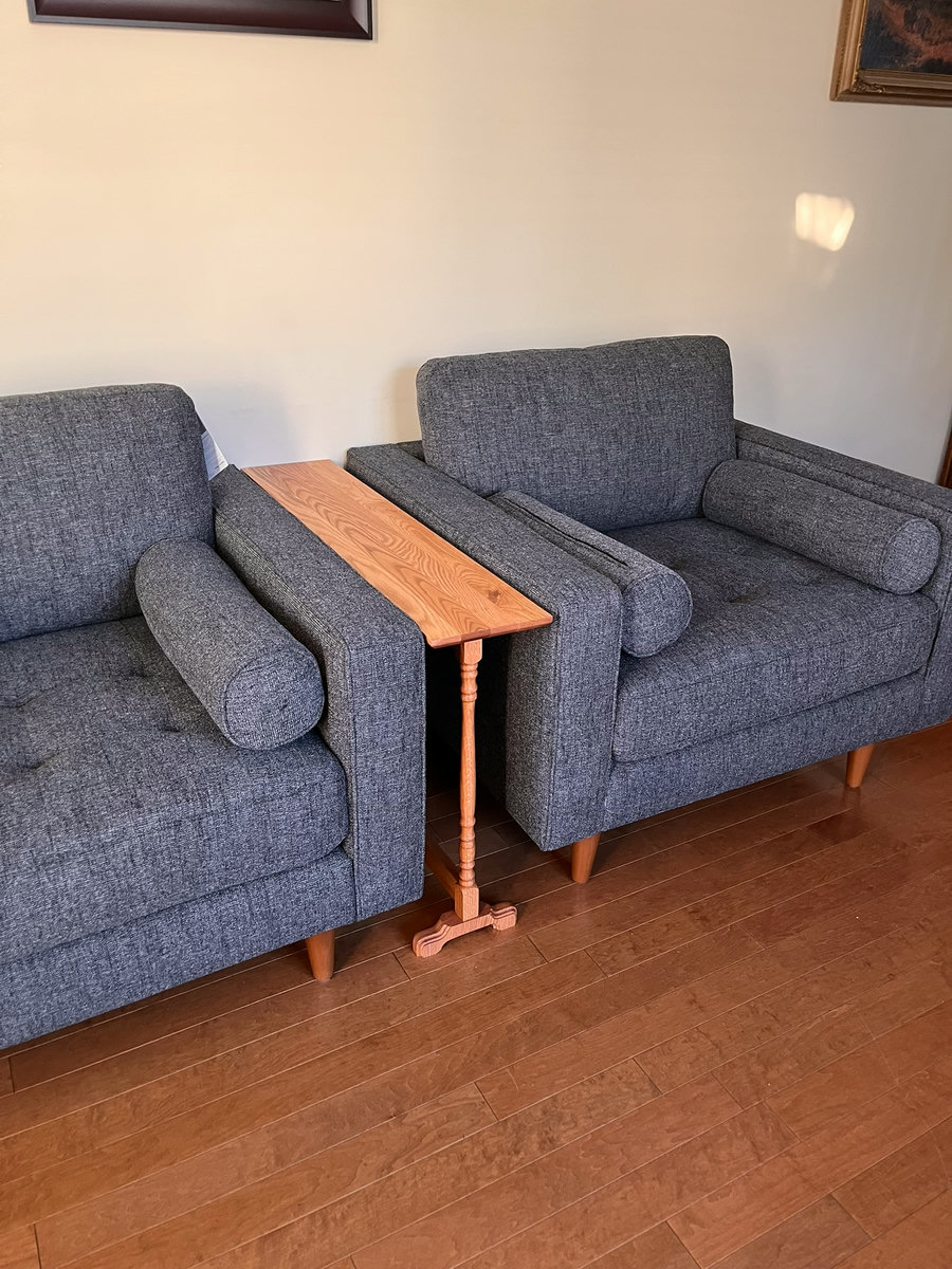 Sofa table — in use between chairs